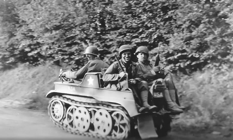 American soldiers in a captured German Sd.Kfz. 2 Kettenkrad. Normandy, 1944.
