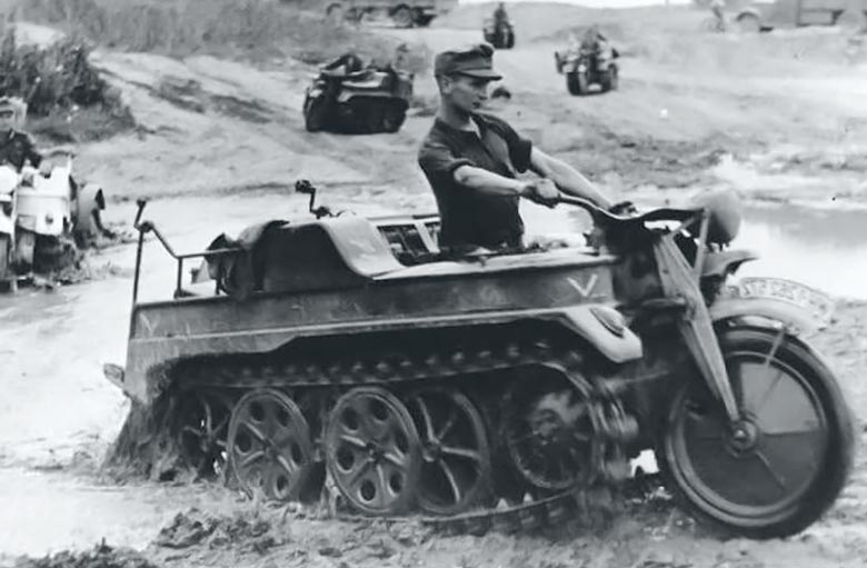 Kettenkrad speeding through mud