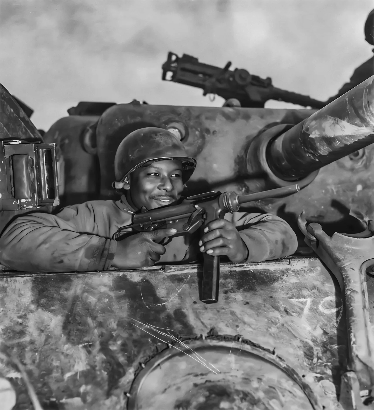 The assistant driver of an M-4 tank armed with the M3 Grease Gun, somewhere in France, November 1944