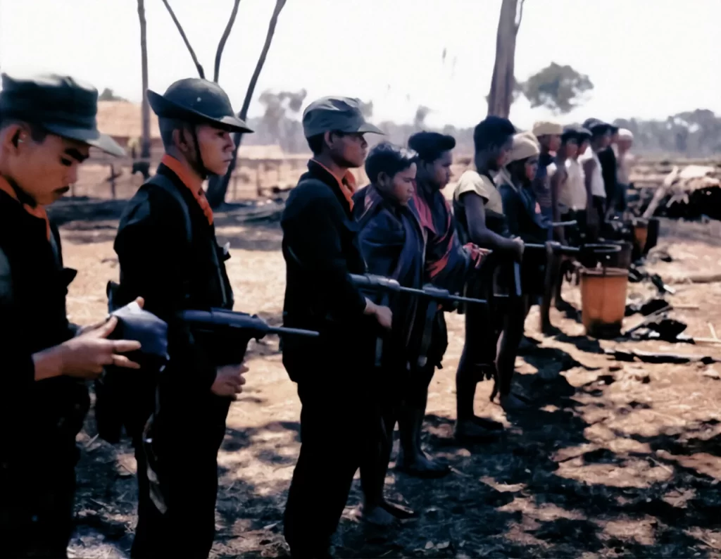 Montagnard Scouts, trained by U.S. Special Forces and the CIA, armed with M3A1 submachine guns, at their training center, Pleiyit, Pleiku Province, Vietnam, circa 1963-1964